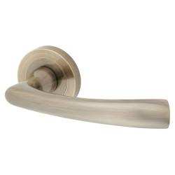 Altro Antique Brass Door Handles on Round Rose - Rochester Range