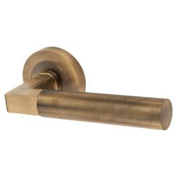 Hampstead Antique Brass Knurled Door Handles on Round Rose