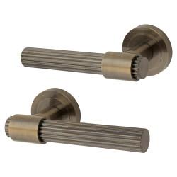 Altro Antique Brass Lines Door Handles on Round Rose - Eva Range