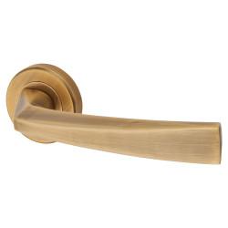 Serozzetta by Carlisle Brass Antique Brass Door Handles on Round Rose - Scopo Range