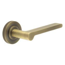 Burlington by Frelan Antique Brass Fire Rated Door Handles on Round Knurled Rose - Fitzrovia Range