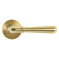 From The Anvil Polished Brass Door Handles on Round Beehive Rose - Newbury Range