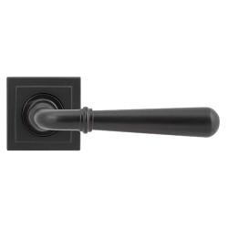 From The Anvil Aged Bronze Door Handles on Square Rose - Newbury Range