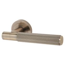 Altro Antique Brass Knurled Door Handles on Round Rose - Remi Range