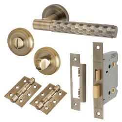 Altro Antique Brass Honeycomb Bathroom Lock Door Handles on Rose Pack - Cara Range