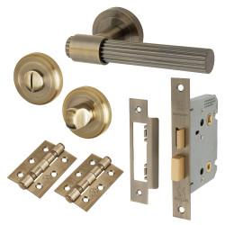 Altro Antique Brass Lines Bathroom Lock Door Handles on Rose Pack - Eva Range