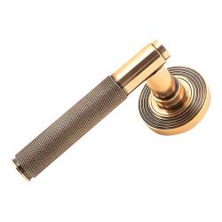 From The Anvil Polished Bronze Knurled Door Handles on Round Beehive Rose - Brompton Range