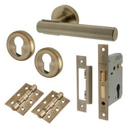 Altro Antique Brass Knurled Euro Lock Door Handles on Rose Pack - Orla Range