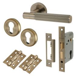Altro Antique Brass Knurled Euro Lock Door Handles on Rose Pack - Remi Range