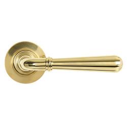 From The Anvil Polished Brass Door Handles on Round Rose - Newbury Range