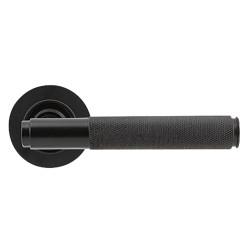 From The Anvil Aged Bronze Knurled Door Handles on Round Rose - Brompton Range
