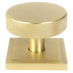 From The Anvil Brompton Satin Brass Round Knurled Centre Door Knob on Square Rose - 90 x 90mm Rose