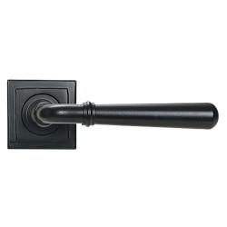From The Anvil Matt Black Door Handles on Square Rose - Newbury Range