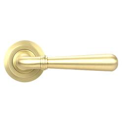 From The Anvil Satin Brass Door Handles on Round Art Deco Rose - Newbury Range