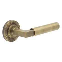 Burlington by Frelan Antique Brass Fire Rated Door Handles on Round Reeded Rose - Westminster Range