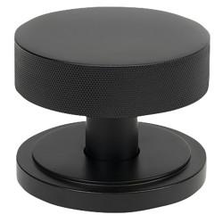 From The Anvil Brompton Matt Black Round Knurled Centre Door Knob on Art Deco Rose - 90mm Rose Diameter