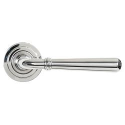 From The Anvil Polished Stainless Steel Door Handles on Round Art Deco Rose - Newbury Range
