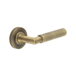 Burlington by Frelan Antique Brass Knurled Fire Rated Door Handles on Round Knurled Rose - Piccadilly Range